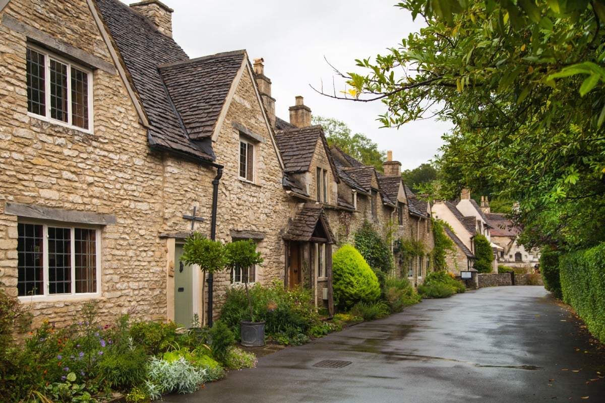 A road with houses in Castle Combe a unique old English village