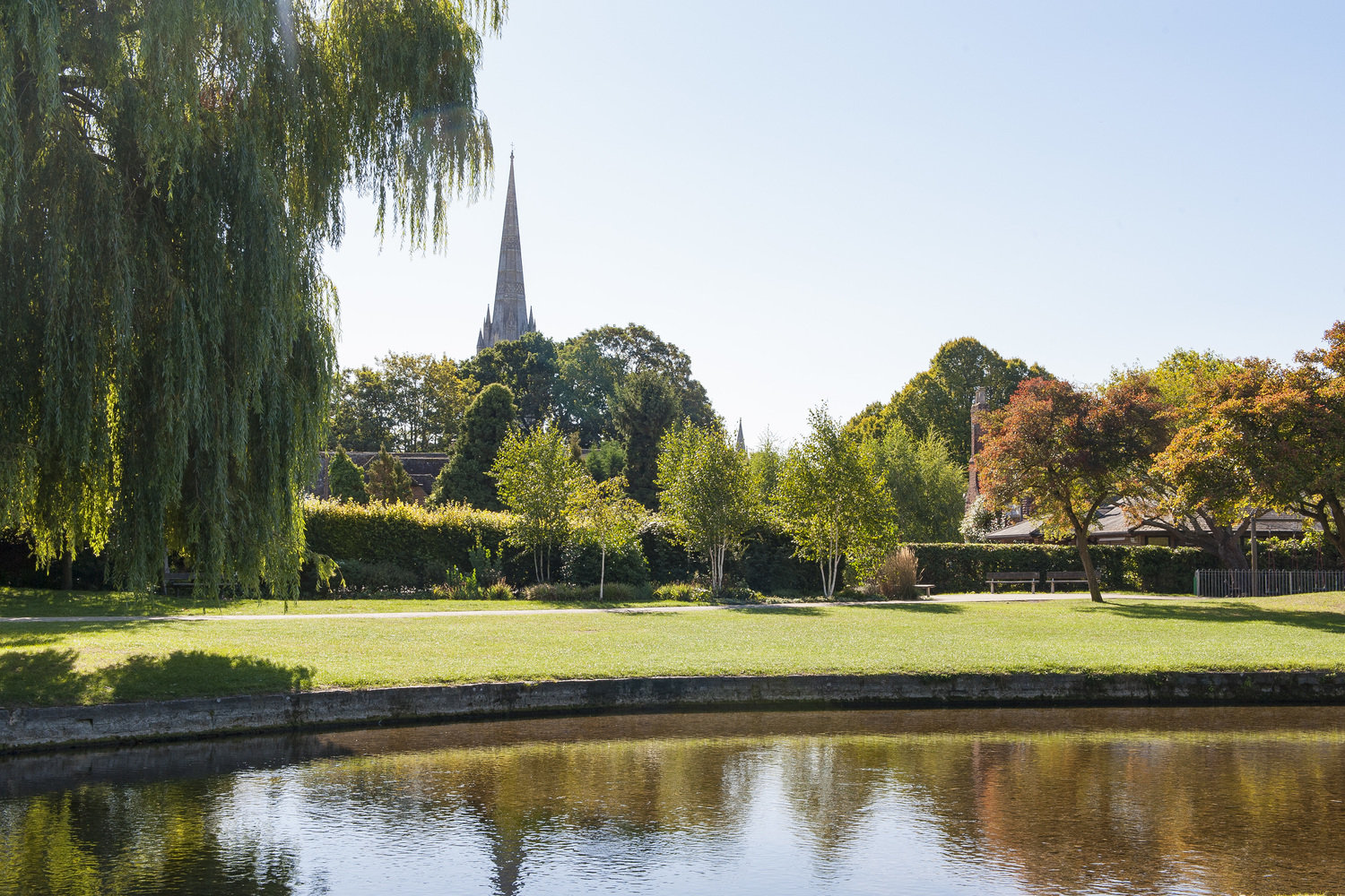 The River Avon running through Queen Elizabeth Gardens, with Salisbury Cathedral in the background.