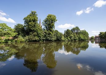 A lake with trees around it.