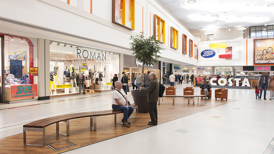 a group of people in a mall