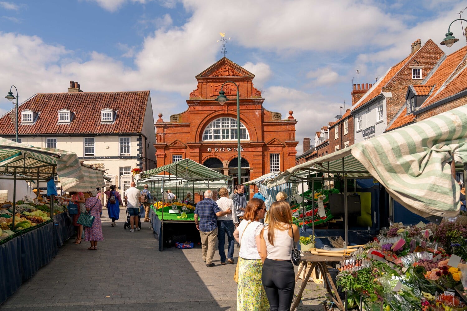 People enjoying a local street market in Beverley.