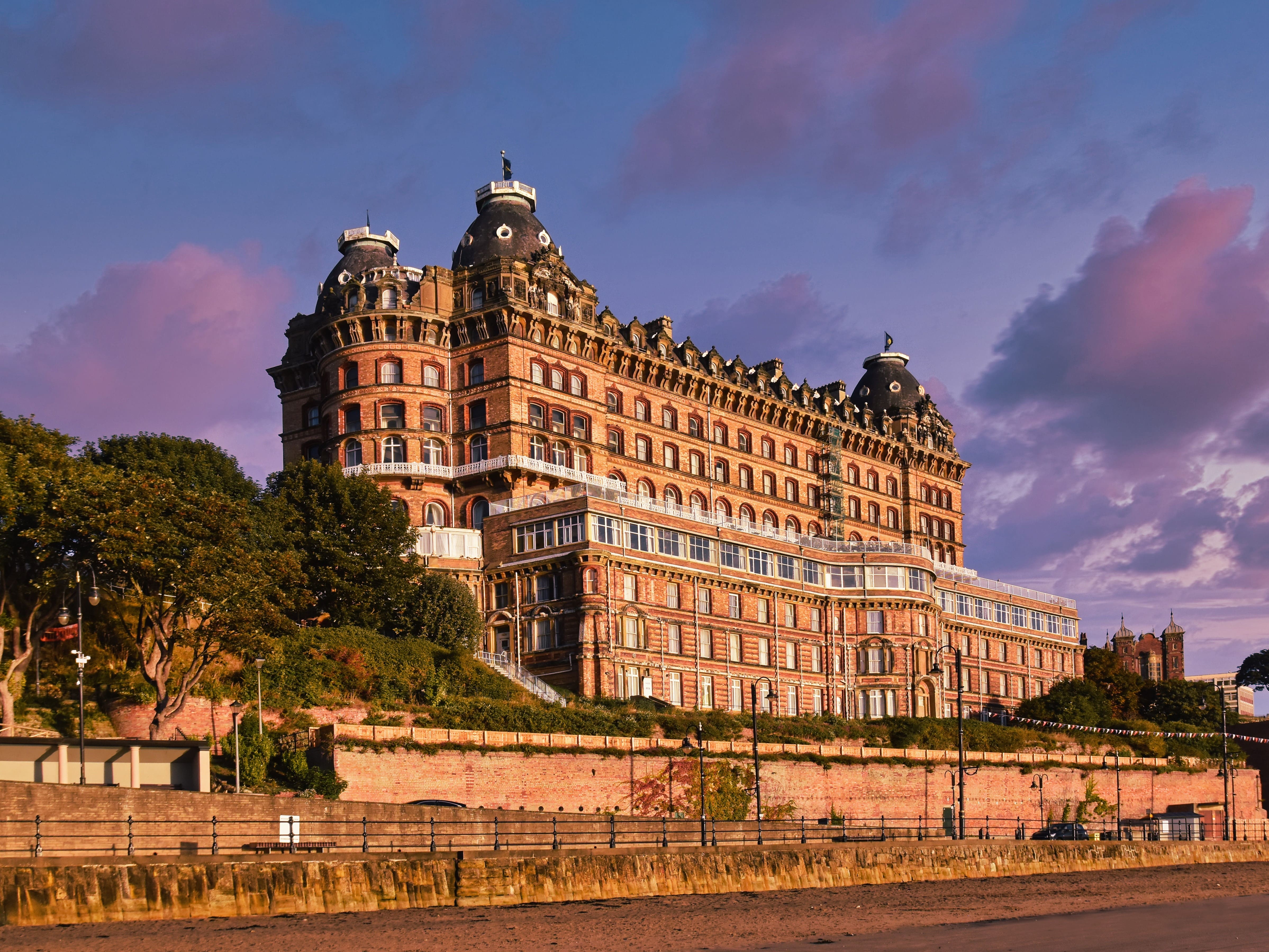 a large building with a fence around it