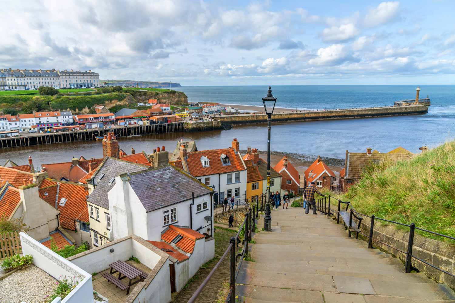 A view of Whitby Pier and the harbour from 199 Steps