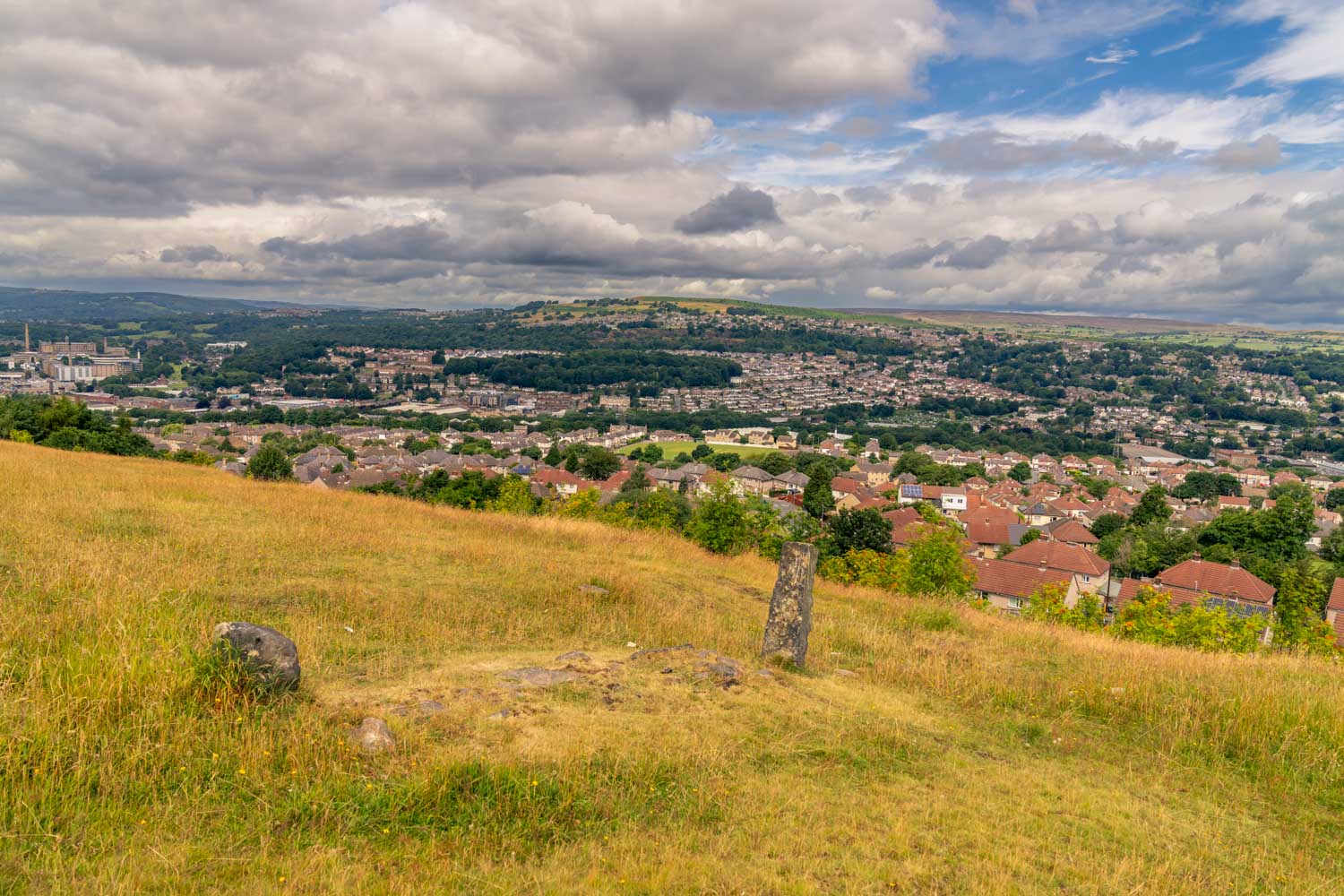 a view of a town from a hill