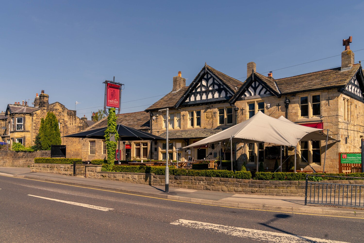 Pub next to a road in Burley in Wharfedalee