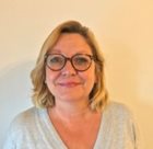 a woman wearing glasses