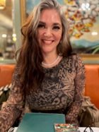 a woman smiling at the camera