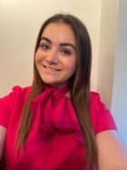 a woman smiling for the camera