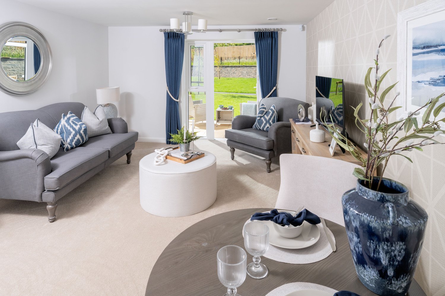 A living room in a McCarthy Stone assisted living retirement apartment.