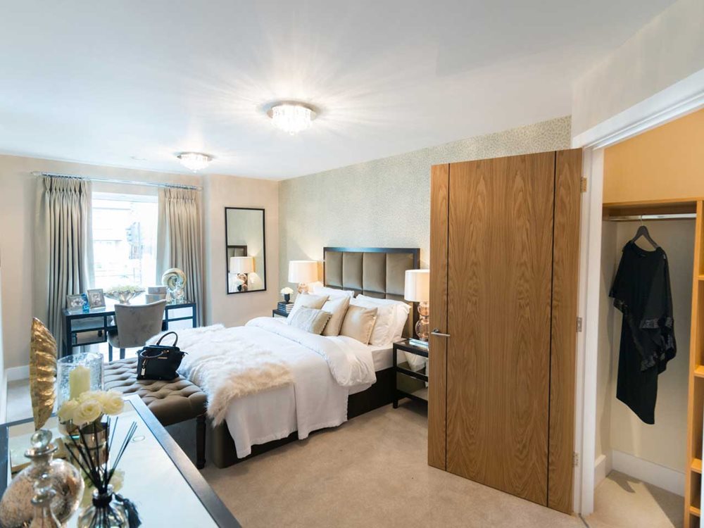 a bedroom with a bed and a closet