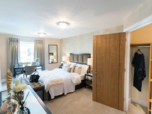 a bedroom with a bed and a closet