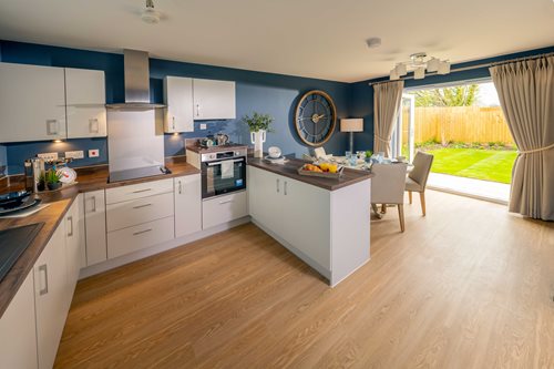 a kitchen with a large window