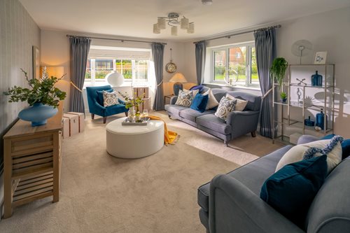 a living room with a couch and a table