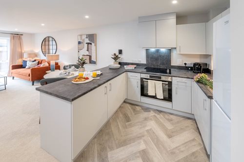 a kitchen with a wood floor