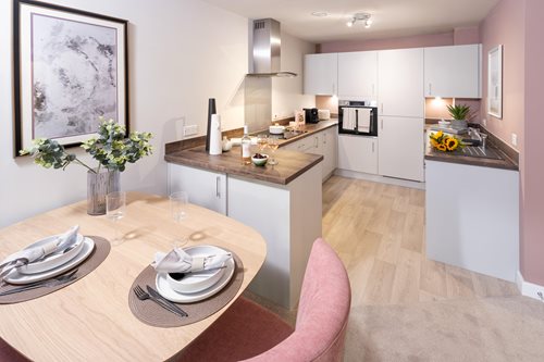 a kitchen with a dining table