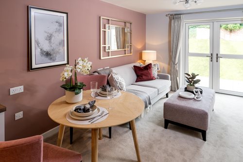 a living room with a couch and coffee table