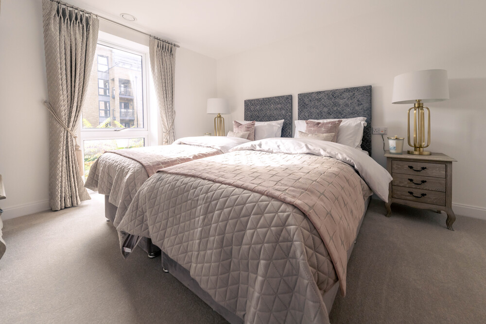 a bed with a large headboard