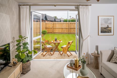 living room with doors to garden