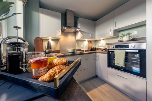 a kitchen with a table and food