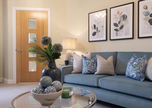 a living room with a couch and table