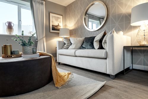 a living room with a couch and table