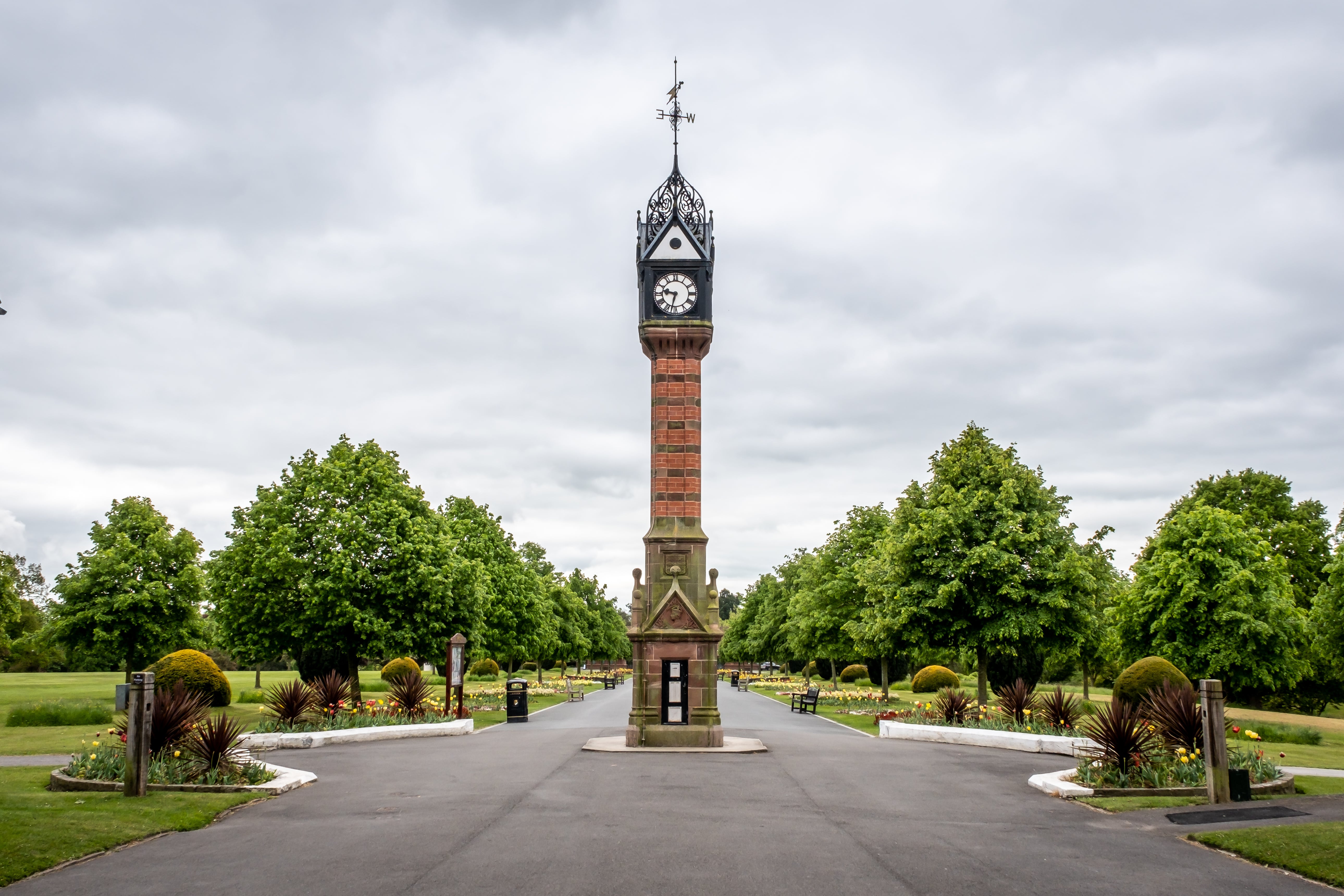 a clock tower in a park
